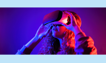 girl using VR headset on blue background