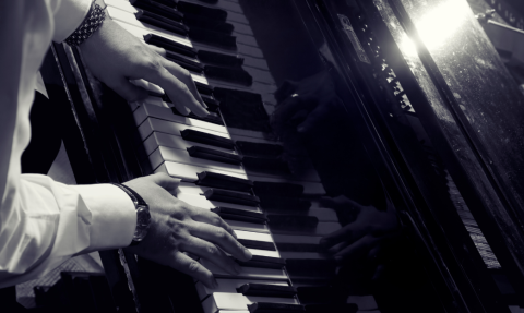 Hands at a piano